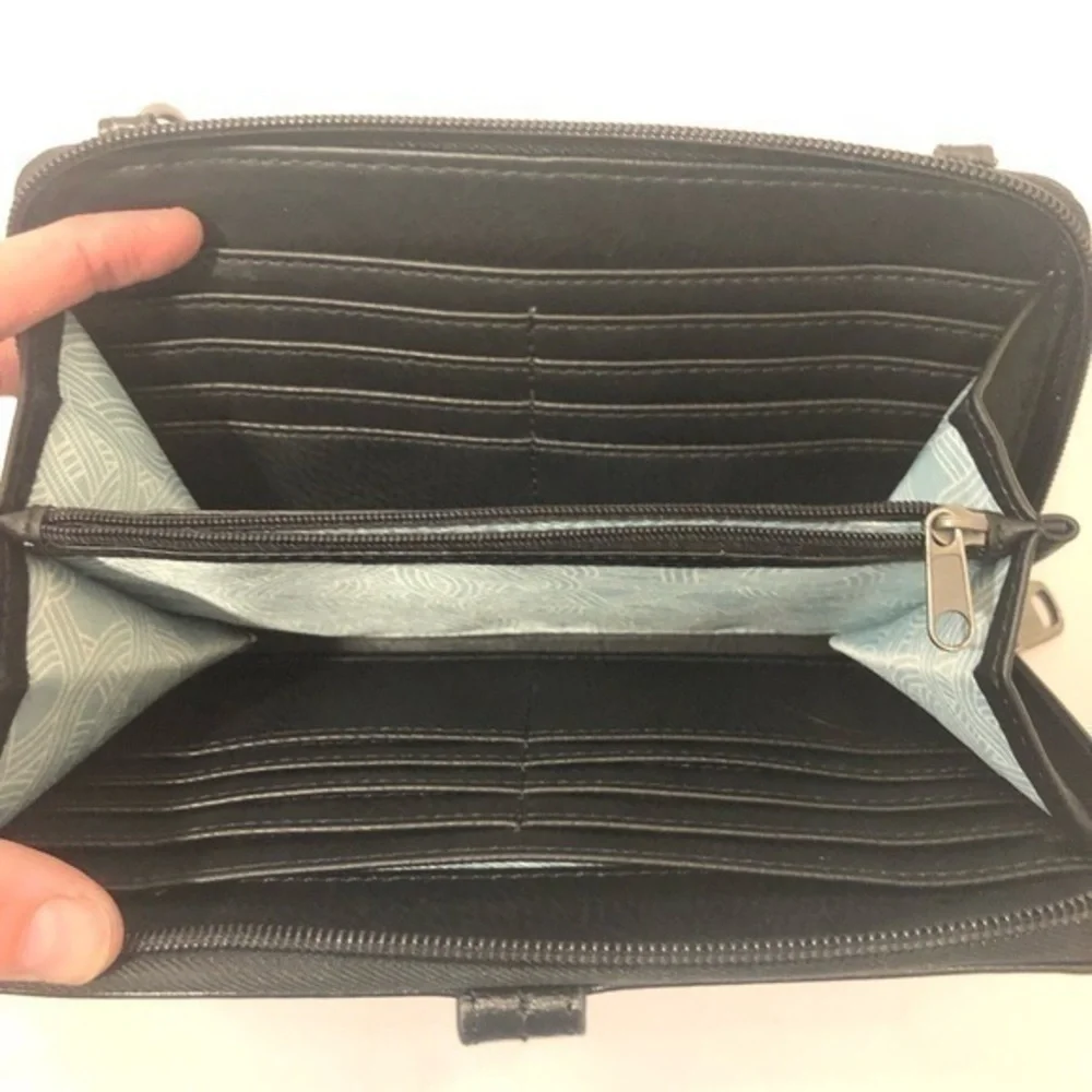 The sak black leather wristlet wallet clutch bag